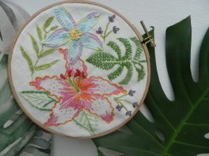 Embroidery hoop with hand-embroidered linen artwork