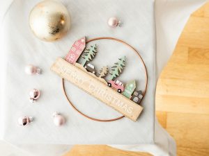 Christmas holiday decorations arranged on a tabletop