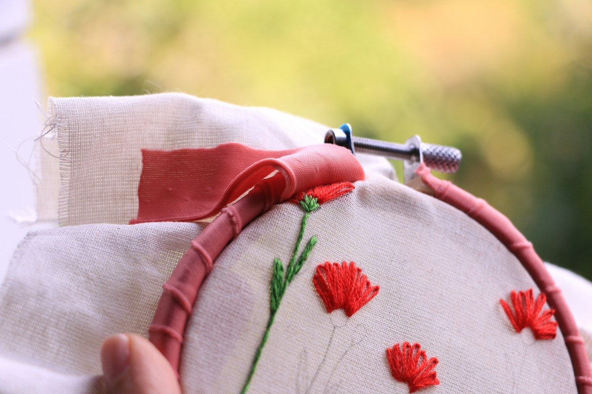 Handmade red and white textile as a seasonal needlework example