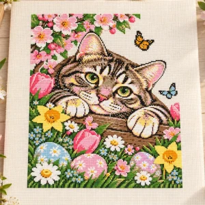 easter-cat-fabric-mockup Illustrative Aida fabric mockup of the tabby kitten with flowers and Easter eggs