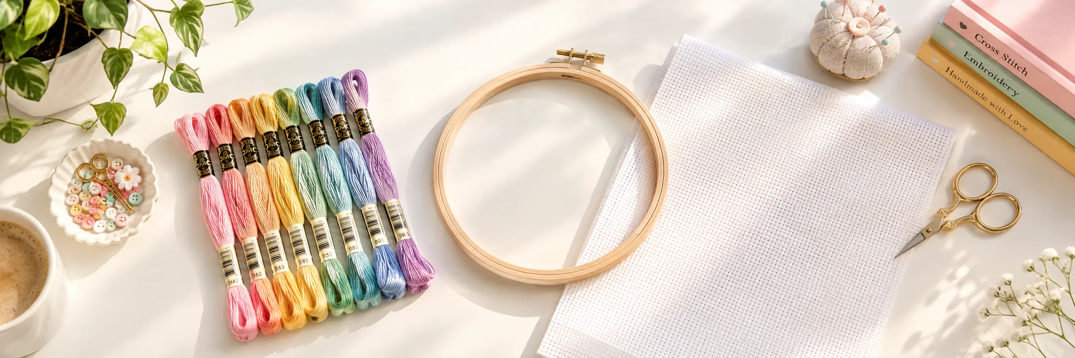 Colorful thread and an embroidery hoop on a craft workspace